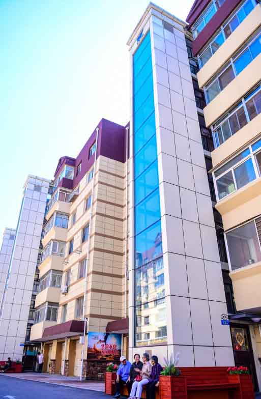 沈河区小西小区是沈阳首个加装电梯全覆盖的小区。沈阳市房产局供图